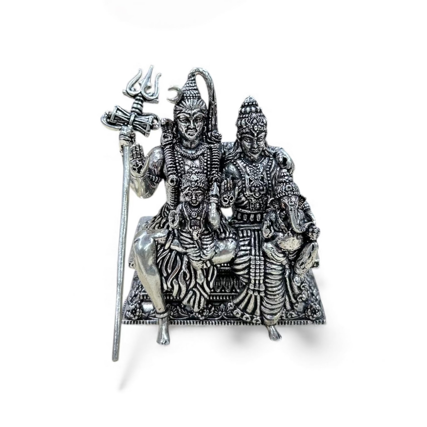Silver statue of a deity with two children on a white background